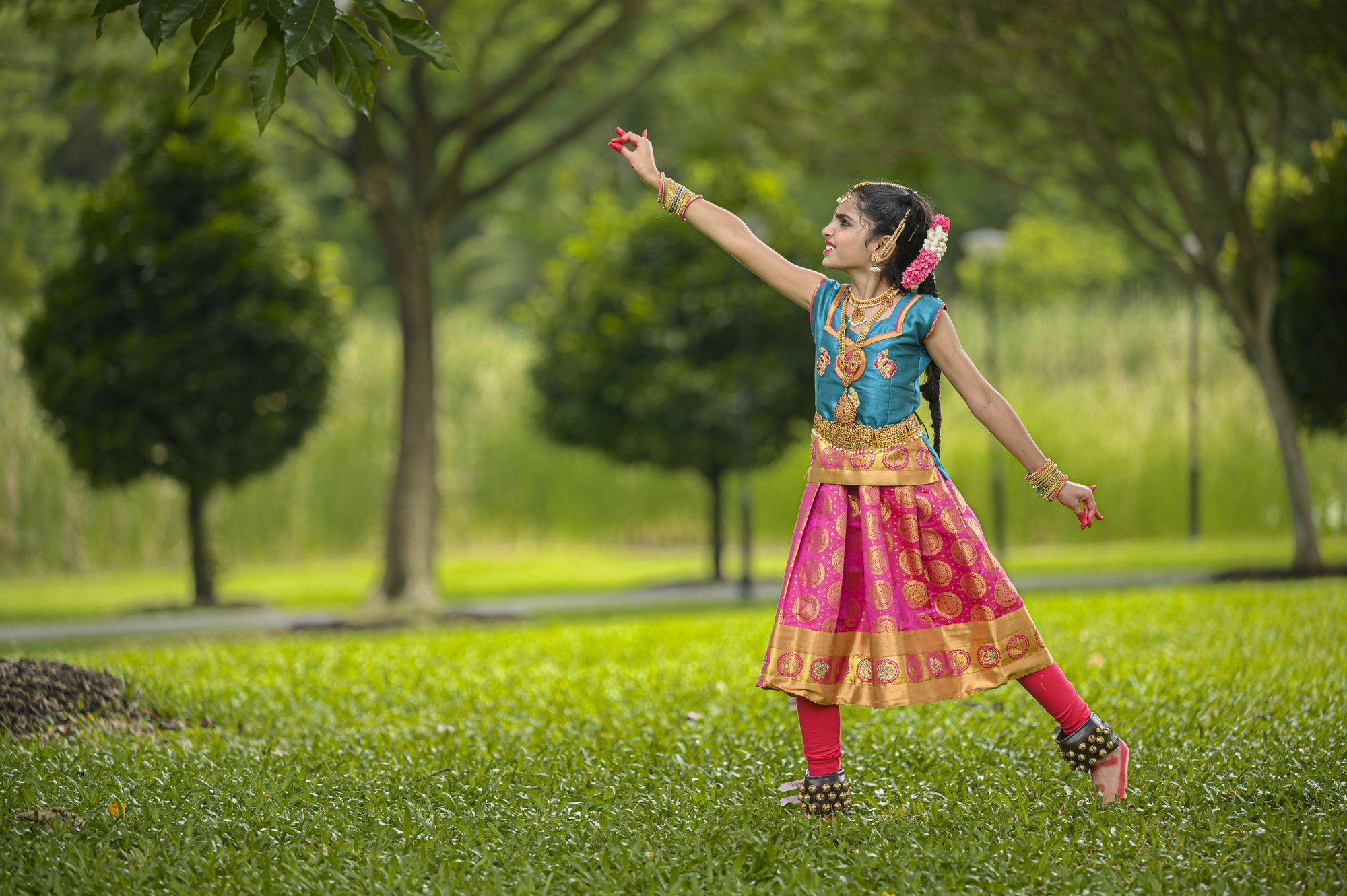 A student in a sweeping arm movement
