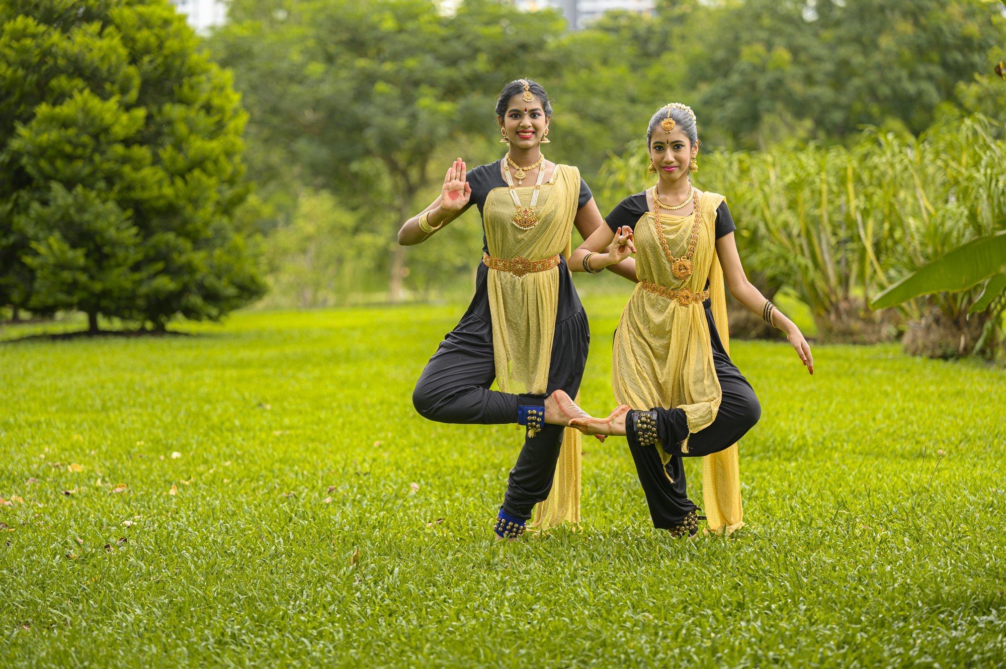 Two senior students dancing in unison